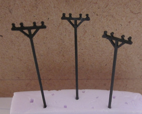 10331– 3 Telefonmasten mit Isolatoren, Spur Z / Telephone poles with insulators, scale Z