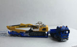 6924RF – MAN Sattelzugmaschine 6 x 4 mit Sattelauflieger und Bagger / MAN tractor 6 x 4 with semi-trailer and excavator